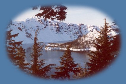 wizard island with llao rock on the rim at crater lake national park in oregon; sightseeing at crater lake national park; enjoying blue water in oregon, volcanoes in oregon: llao rock, hillman peak, mt scott; hiking trails: hiking garfield peak, hiking to watchman tower, hiking mt scott, hiking to sun notch to view phantom ship; viewing wineglass tuff and the pumice castle from the rim or from water on one of the boat tours of crater lake; experiencing the geology of oregon: volcanoes, the mountain caldera, the fault geology of klamath basin, scarps; taking one of the boat tours on crater lake after walking down the rim to the water on cleetwood trail, swimming in crater lake, picnicking at grouse point at crater lake; enjoying wildlife viewing at crater lake national park: eagles, hawk, lynx, martins, deer; hiking castle crest at crater lake and viewing wildflowers, hiking to little crater, hiking up union peak, all in crater lake national park in the cascades mountains of oregon.