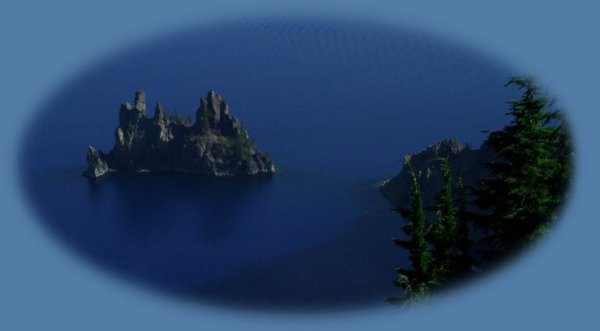 wizard island with llao rock on the rim at crater lake national park in oregon; sightseeing at crater lake national park; enjoying blue water in oregon, volcanoes in oregon: llao rock, hillman peak, mt scott; hiking trails: hiking garfield peak, hiking to watchman tower, hiking mt scott, hiking to sun notch to view phantom ship; viewing wineglass tuff and the pumice castle from the rim or from water on one of the boat tours of crater lake; experiencing the geology of oregon: volcanoes, the mountain caldera, the fault geology of klamath basin, scarps; taking one of the boat tours on crater lake after walking down the rim to the water on cleetwood trail, swimming in crater lake, picnicking at grouse point at crater lake; enjoying wildlife viewing at crater lake national park: eagles, hawk, lynx, martins, deer; hiking castle crest at crater lake and viewing wildflowers, hiking to little crater, hiking up union peak, all in crater lake national park in the cascades mountains of oregon.